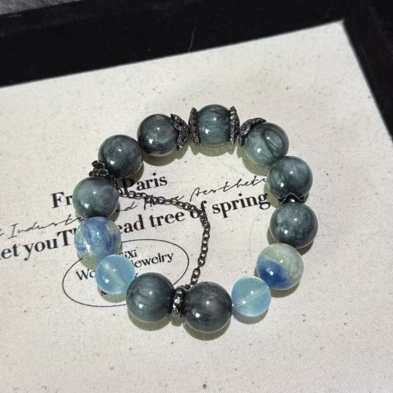 Hawk eye stone, blue crystal, and aquamarine bracelet